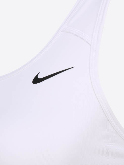 Bílá podprsenka Nike na cvičení